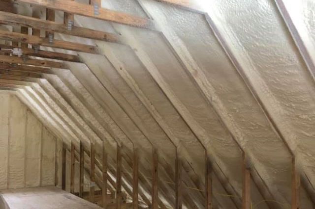 Closed-cell spray foam insulation installed between wall studs